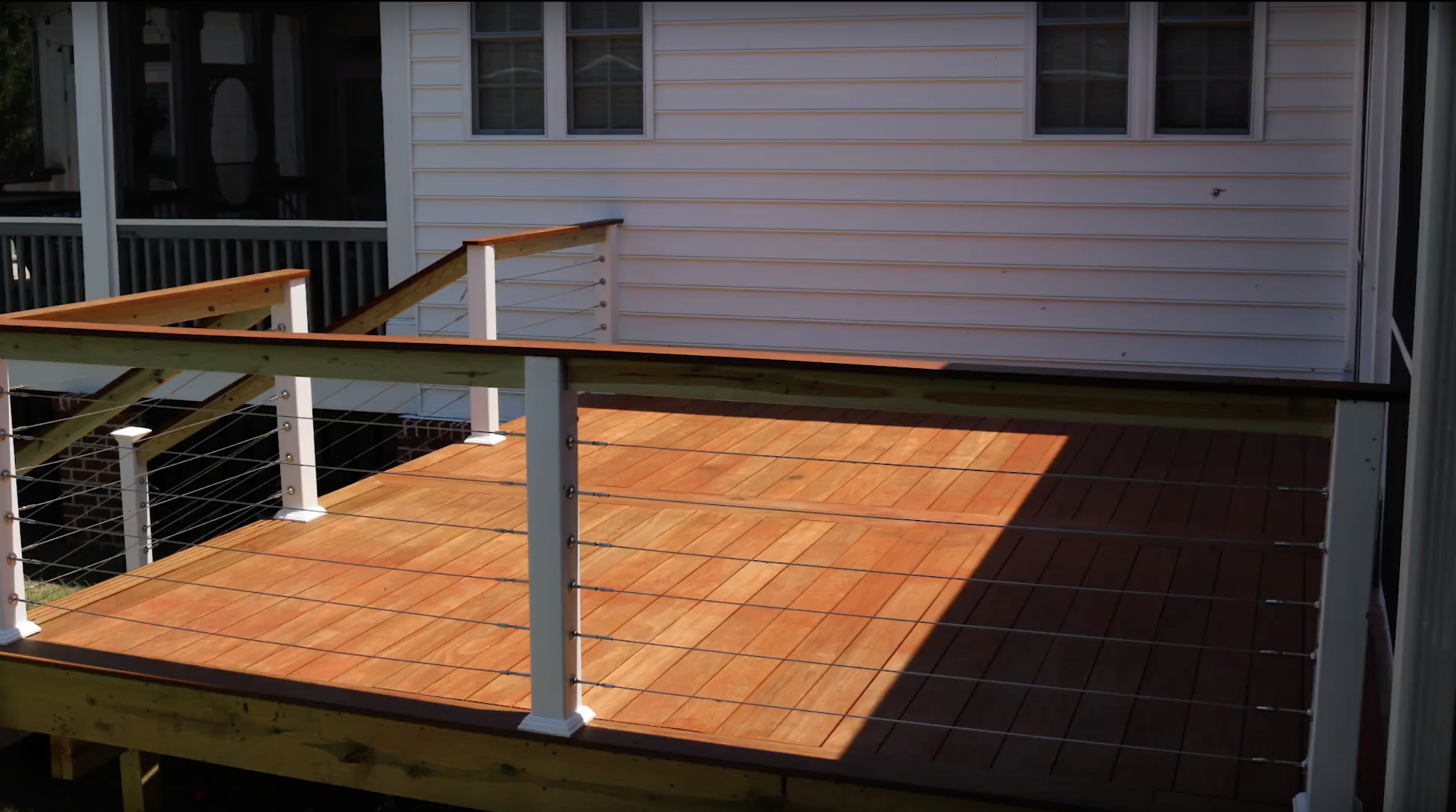 Wood decking made with Kebony® the sun.